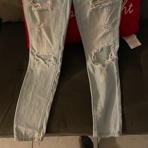 Brand new ripped jeans with tags